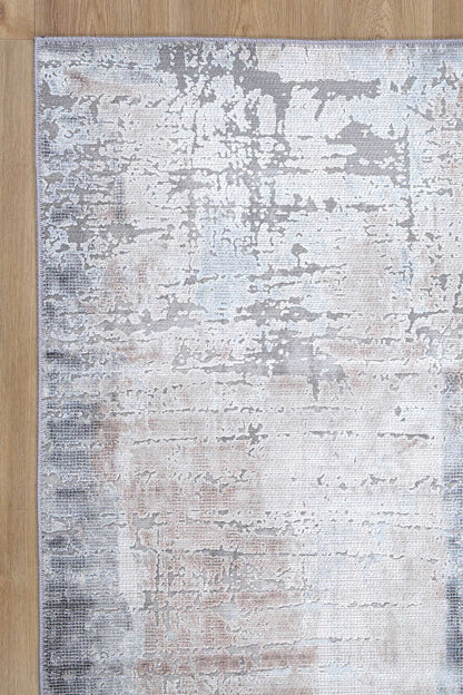 Elegant and practical, the Abstract Twilight Ash Rug adds a touch of sophistication to any room while being easy to clean and maintain.